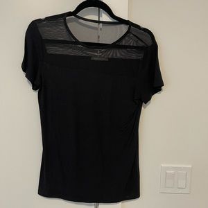 Suzy Shier smart black top with sheer detail. Size medium. New